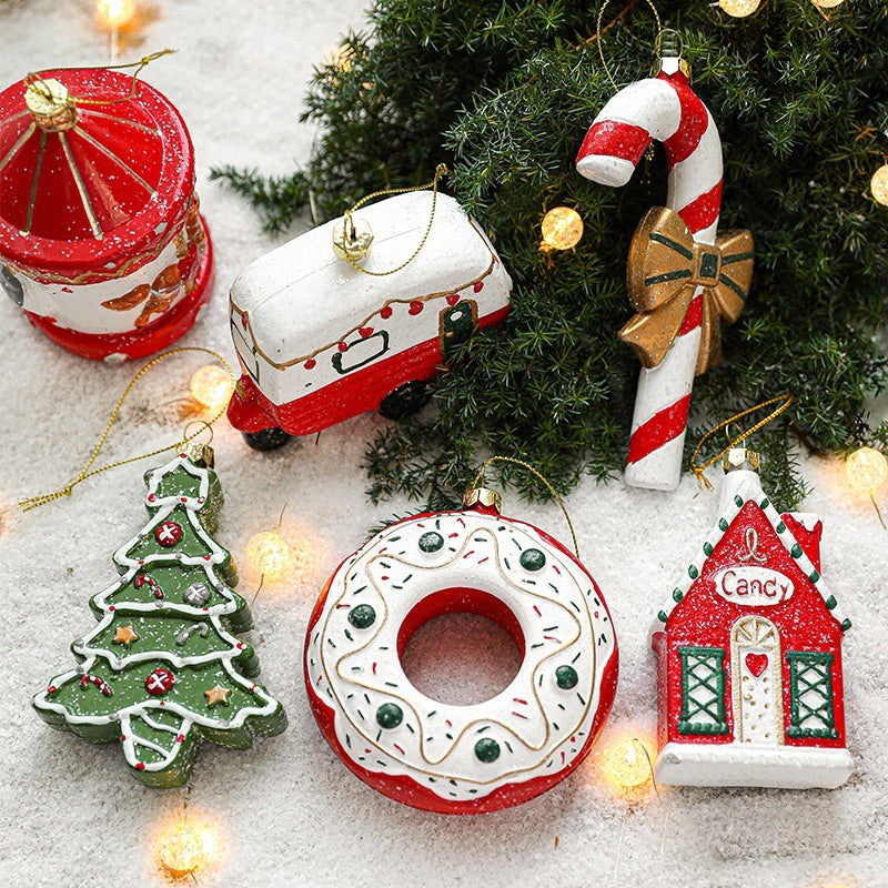 Painted plastic Christmas tree pendant decoration in festive holiday design