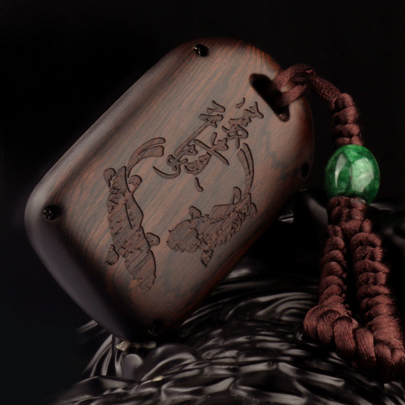 Sandalwood key case with natural wood grain and compact design