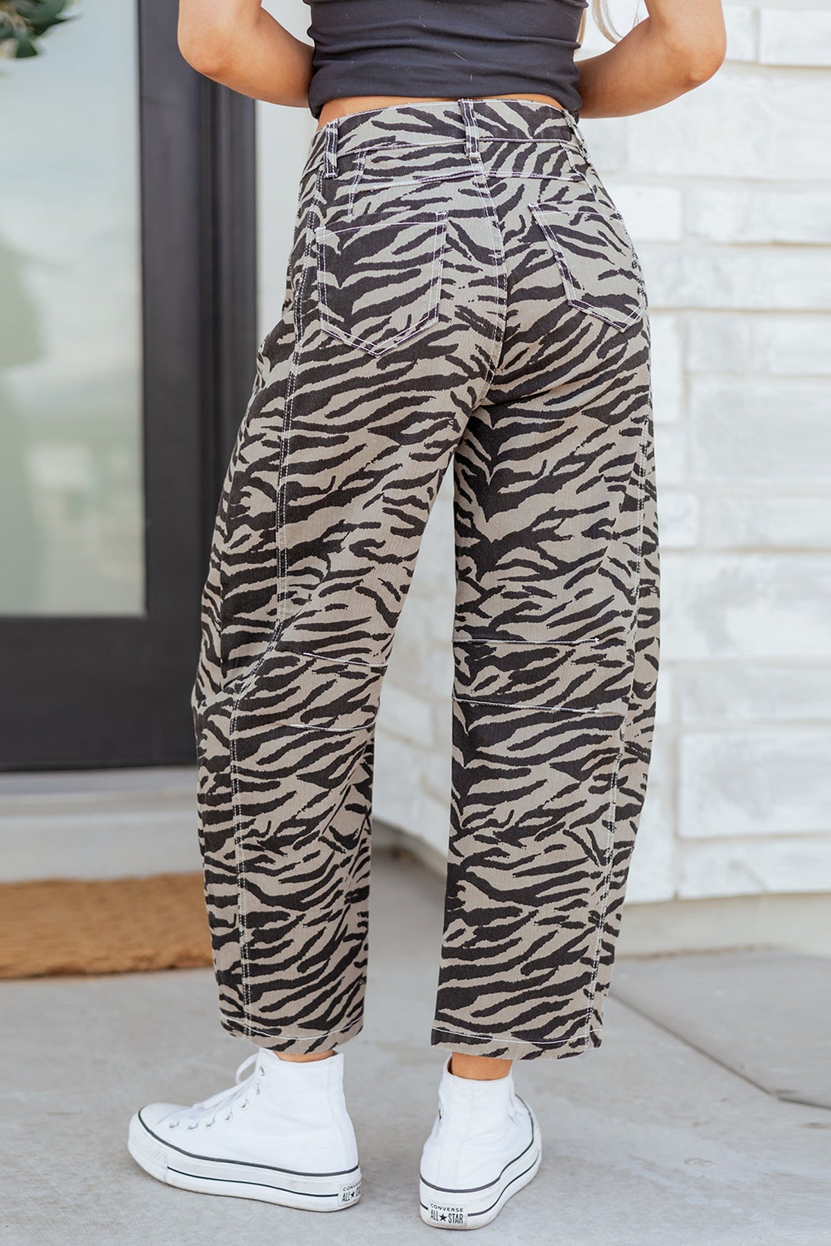 Hunter printed wide leg jeans by Threaded Pear featuring bold floral pattern and relaxed fit, shown in a full-length shot.