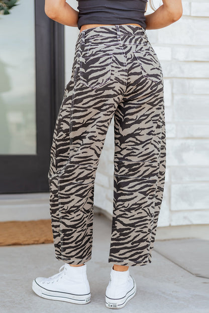 Hunter printed wide leg jeans by Threaded Pear featuring bold floral pattern and relaxed fit, shown in a full-length shot.