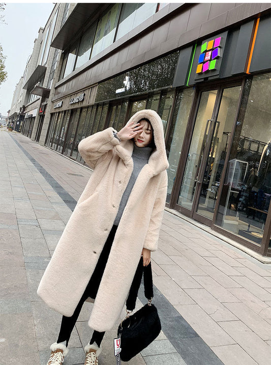 Faux fur mink women’s plush coat in a soft, textured design with long sleeves and a cozy silhouette