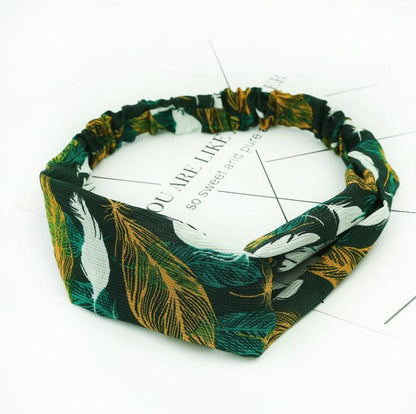 Women's retro style printed headband with colorful pattern on white background