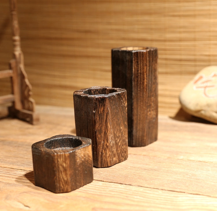 Solid wood candle holder with a natural wood finish from My Store