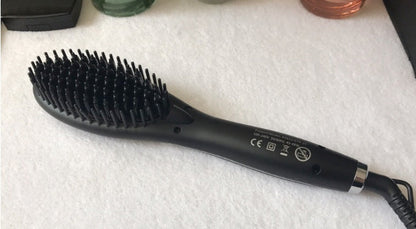 Ceramic hair straightening brush by My Store with heated bristles for smoothing and styling hair