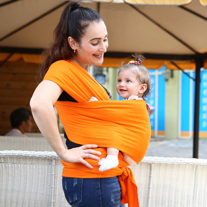 Solid color baby sling carrier in a soft fabric design