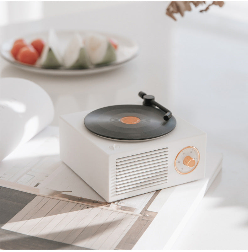 Wireless mini portable retro phonograph Bluetooth-compatible speaker in vintage record player design