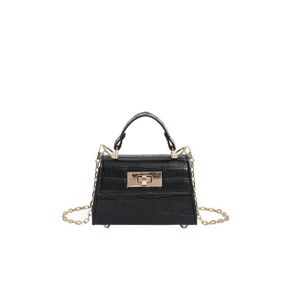 Casual small square handbag with shoulder strap, front view