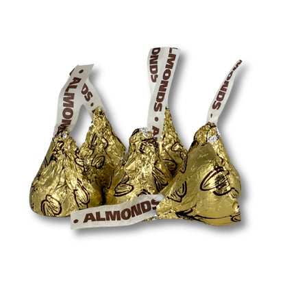 Hershey's Kisses Milk Chocolate with Almonds in a bulk Candy In Bulk bag, showing shiny foil-wrapped chocolates with almond pieces