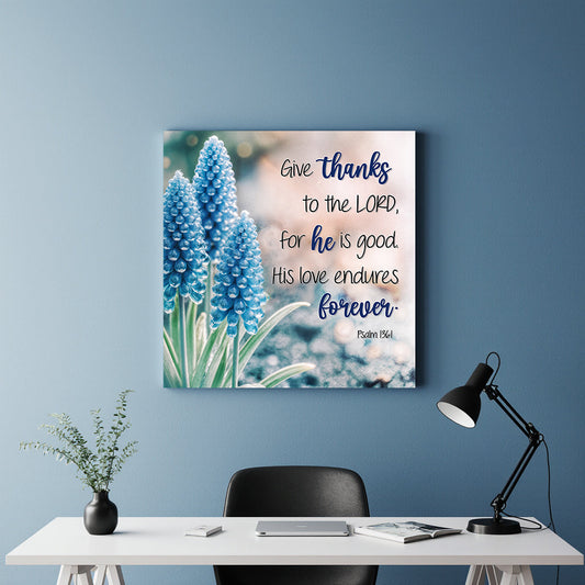 Canvas wall sign featuring Psalm 136:1 "Give Thanks To The Lord" in elegant lettering, from Tailored Canvases.