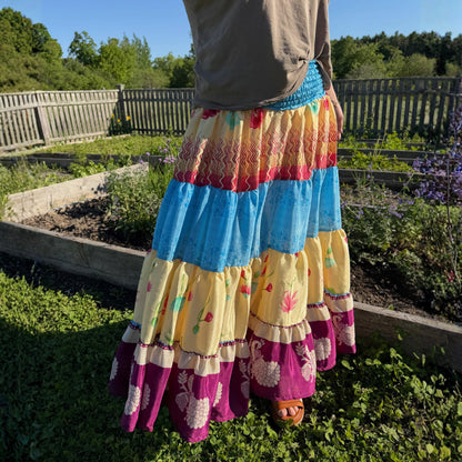 Darn Good Yarn Woodstock Dreams Fiesta Sunset skirt featuring vibrant, bohemian-inspired fabric and intricate design details.