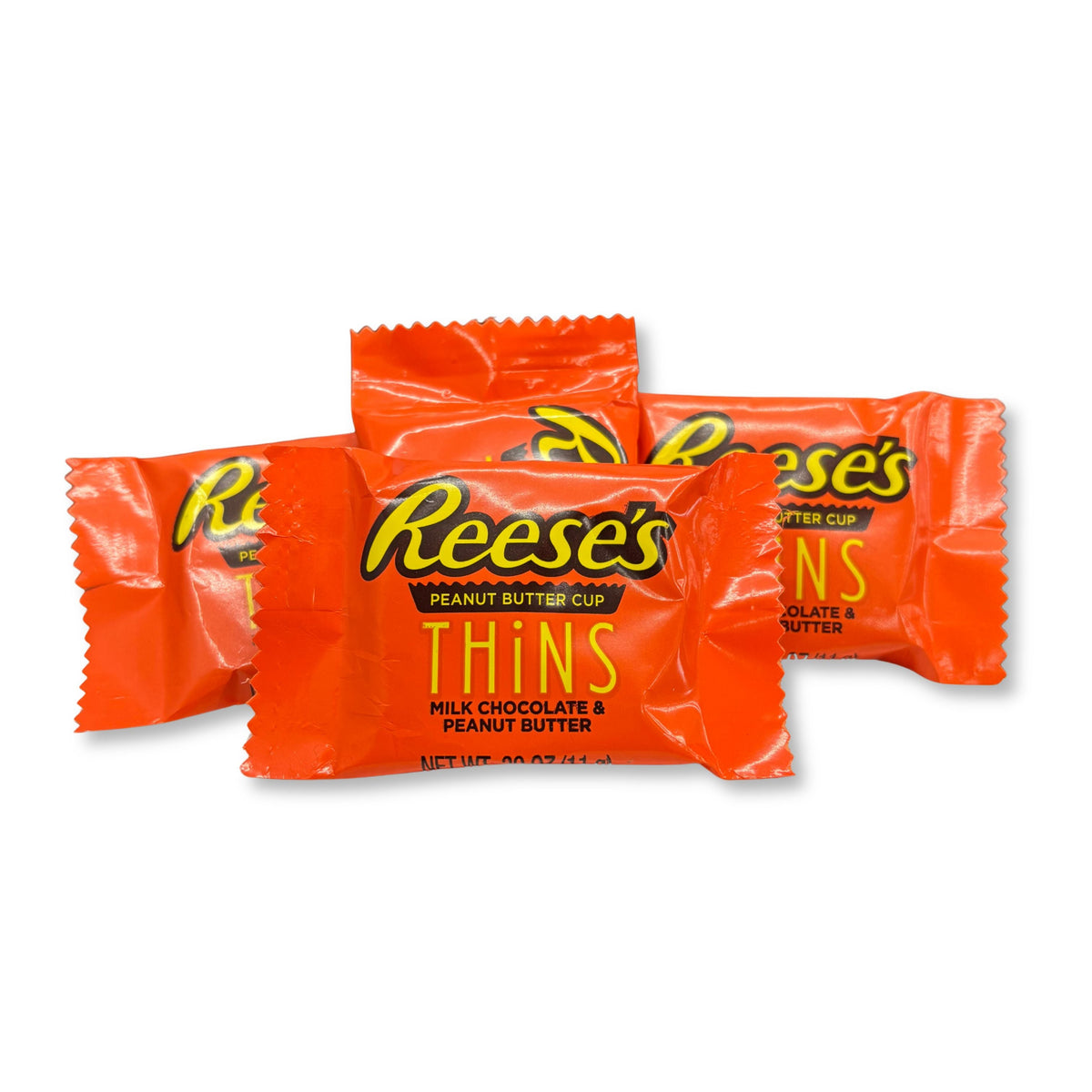 Reese's Peanut Butter Cup Thins Milk Chocolate in a package, thin chocolate cups filled with peanut butter, by Candy In Bulk.