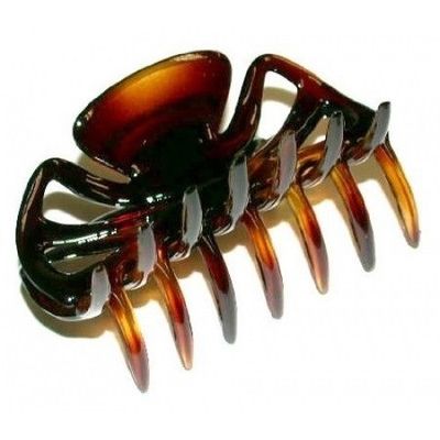 Medium Mars Claw hair pins by Pasteur Pharmacy, showcasing sleek, curved metal hair clips for styling and securing hair.