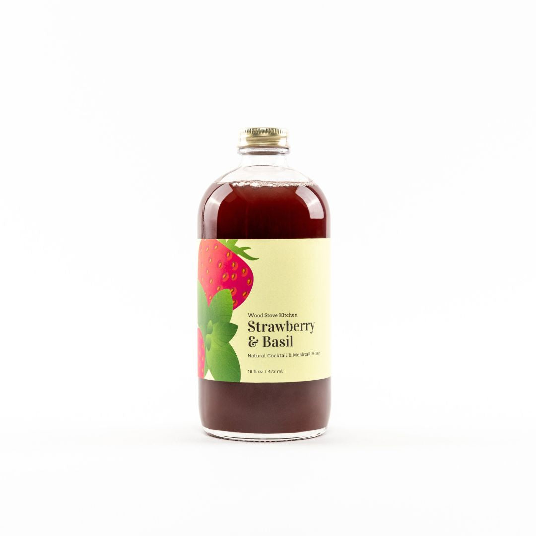 Wood Stove Kitchen Strawberry and Basil cocktail and mocktail mixer in a 16 fl oz bottle, featuring fresh fruit and herb ingredients.
