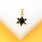 18K gold filled Star of David pendant with black enamel detailing, crafted by MIA Jewelry, hanging on a delicate chain.