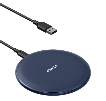 Anker 313 wireless charging pad for smartphones, slim and flat design, with charging indicator light visible on the pad.