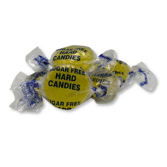 Sugar-free Arcor Lemon Drops candy in a bulk bag, featuring bright yellow lemon-flavored hard candies from Candy In Bulk.