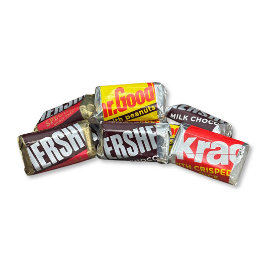 Assorted Hershey's Miniatures chocolate candy bars in a bulk value bag, featuring various classic chocolate flavors by Candy In Bulk.