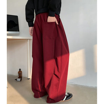 Plus size fleece-lined heavy loose track pants in a relaxed fit, shown in detail