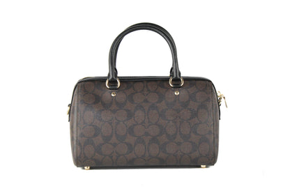 Coach Rowan Brown and Black Signature Leather Medium Satchel Handbag with top handles and gold-tone hardware