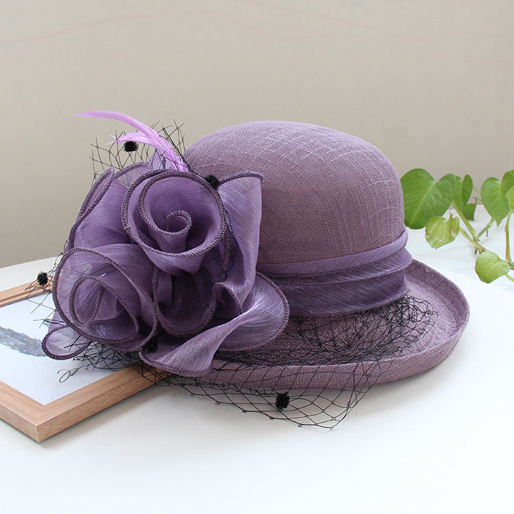 Banquet flower top hat with curled brim sun hat, detailed floral decoration in view