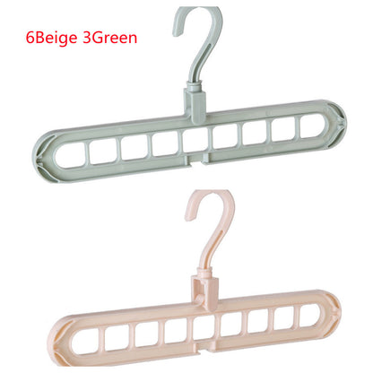 Plastic clothes hanger with storage hook for organizing garments