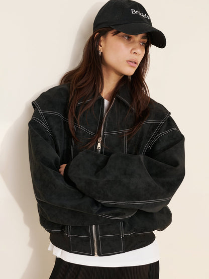 Turn-down collar faux leather short jacket in black with zip front and long sleeves