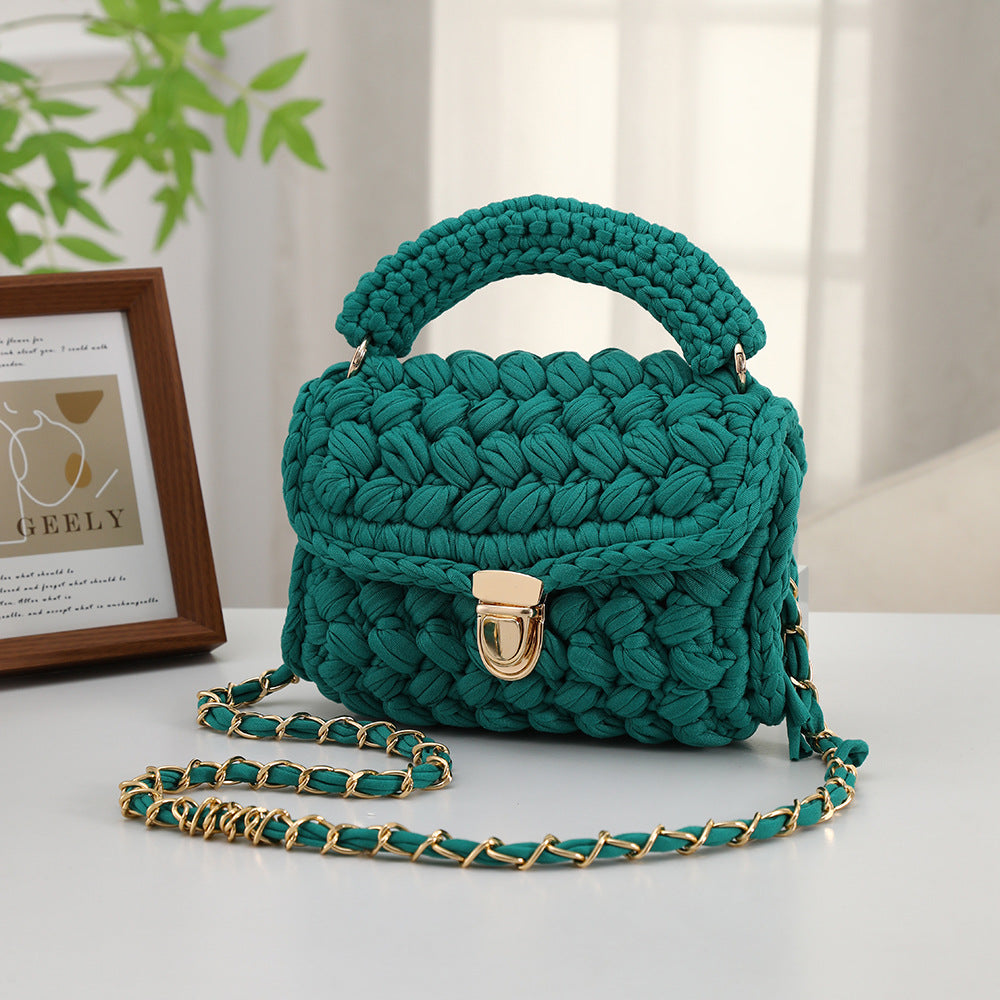 Handwoven women's tote bag in a minimalist style, featuring a spacious woven design and sturdy handles