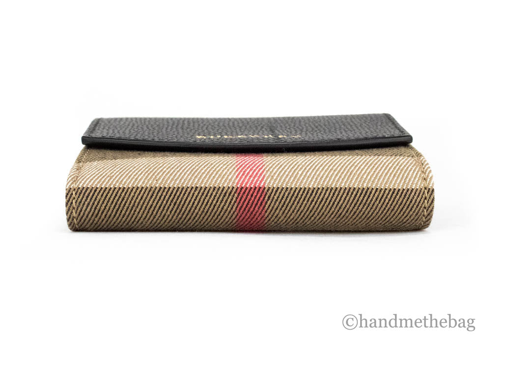 Black leather Burberry Luna coin pouch with house check pattern, compact wallet designed for coins and small essentials.