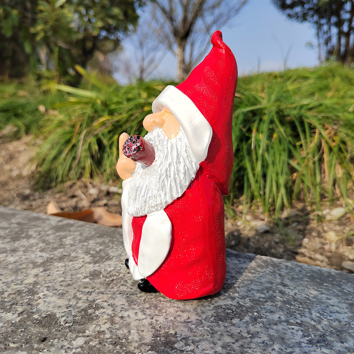 Statue garden Christmas decorations displayed outdoors with festive seasonal details