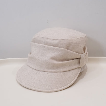 Old money style retro ruffled flat-top bowler hat in a classic artistic design