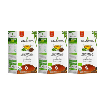 Organic Moringa Rooibos herbal tea by Miracle Tree in a tea bag, showcasing dried herbs and tea packaging.