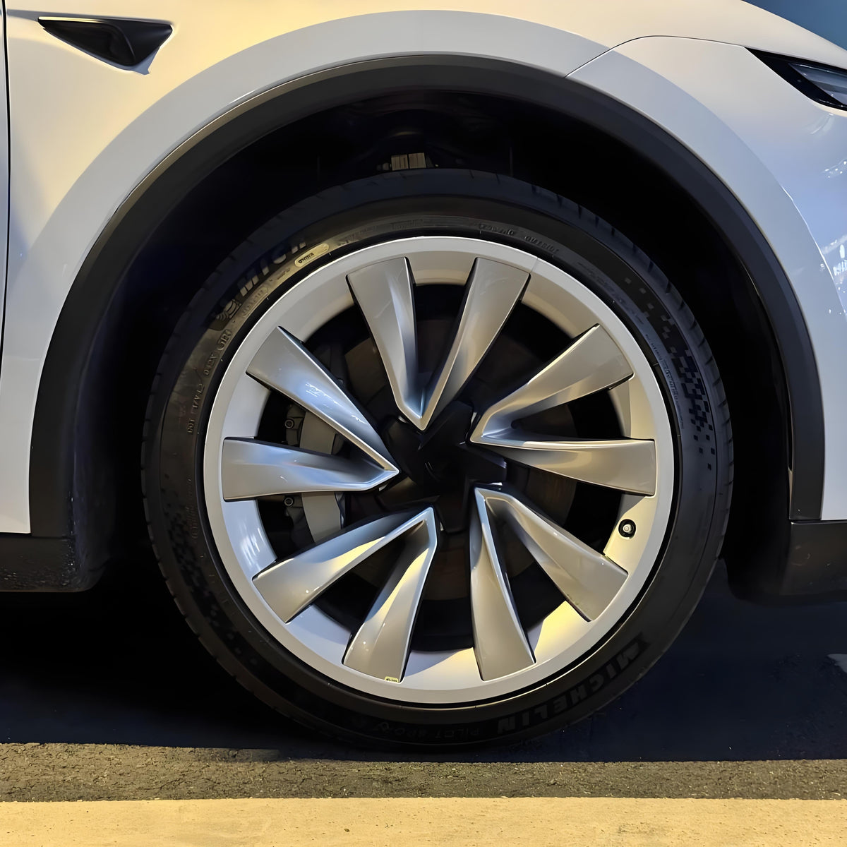 Set of four 20-inch wheel rim protectors for Tesla Model Y Juniper, compatible with Tesla Model Y wheel covers.