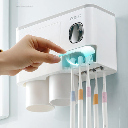 Non-marking hanging magnetic toothbrush holder with single drawer, toothpaste squeezer and toiletry storage rack