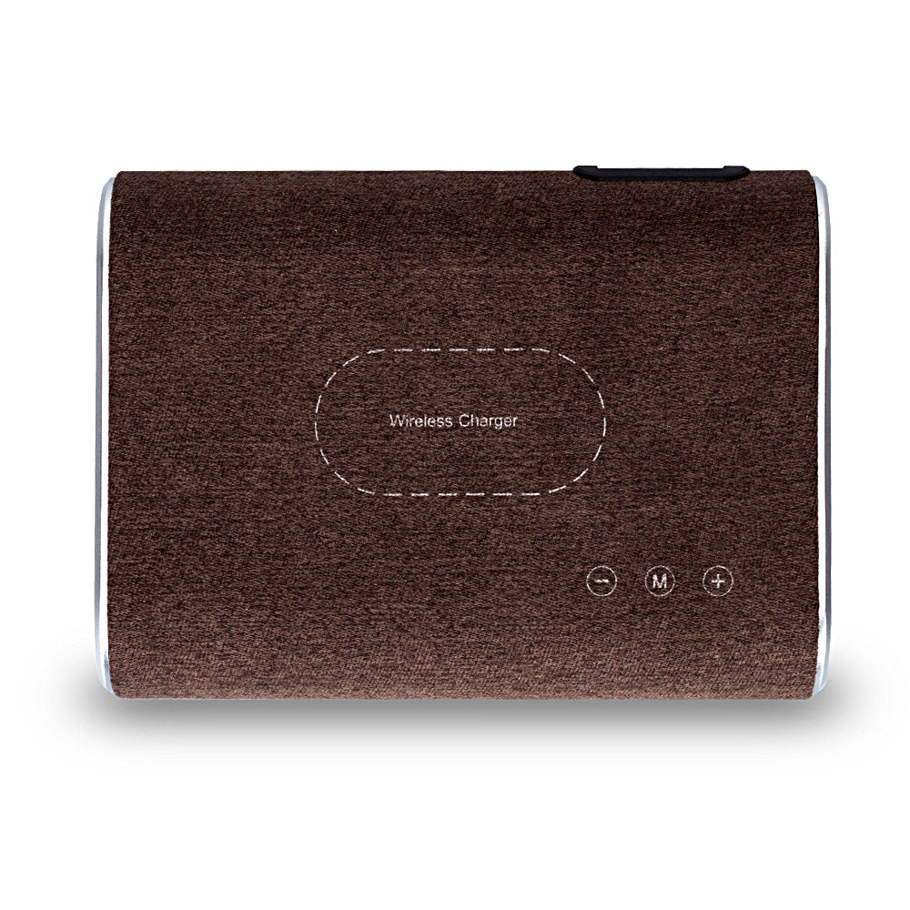Wireless charger speaker with integrated charging pad and compact modern design