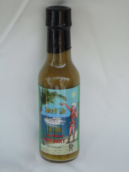 Cinderosa Ranch Spice O' Life Jalapeno Hot Sauce bottle with red label and hot sauce inside, spicy condiment for meals.