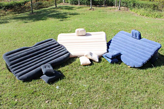 Inflatable car bed for vehicle back seat, shown with raised sides and soft sleeping surface