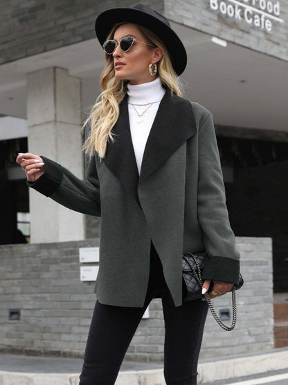 Notch-lapel contrast-color long-sleeve wool blazer in a tailored design