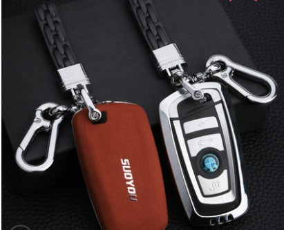 Black key case with compact design and secure key ring closure