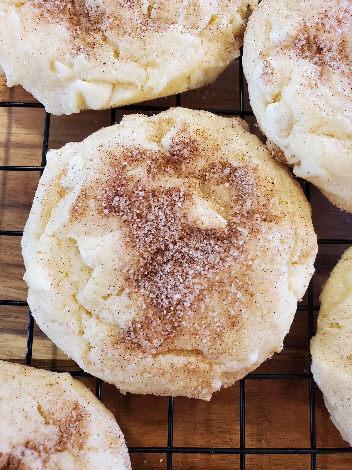 White Chocolate Snickerdoodle cookies from Let's Get Baked Artisan Desserts, a dozen freshly baked cookies with cinnamon and white chocolate chunks.