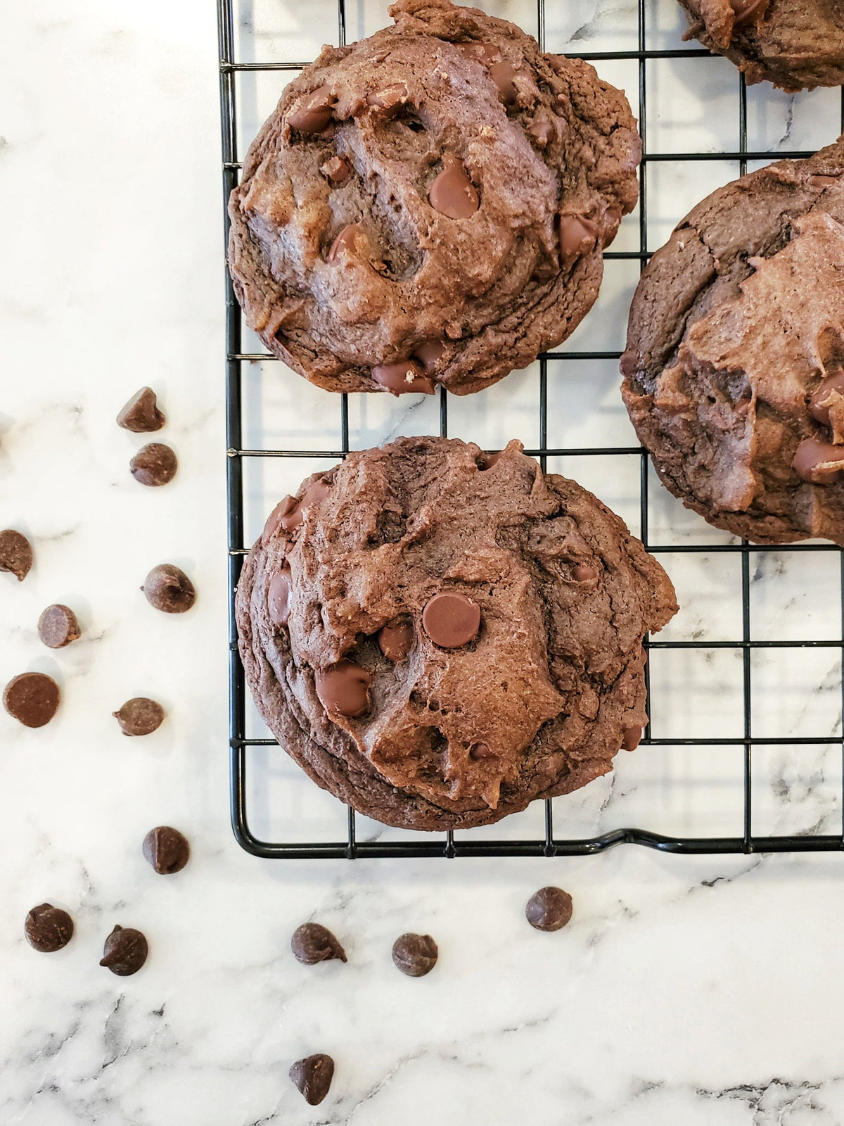 Assorted Death by Chocolate cookies from Let's Get Baked Artisan Desserts, featuring rich chocolate flavors and decadent textures.