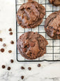 Assorted Death by Chocolate cookies from Let's Get Baked Artisan Desserts, featuring rich chocolate flavors and decadent textures.