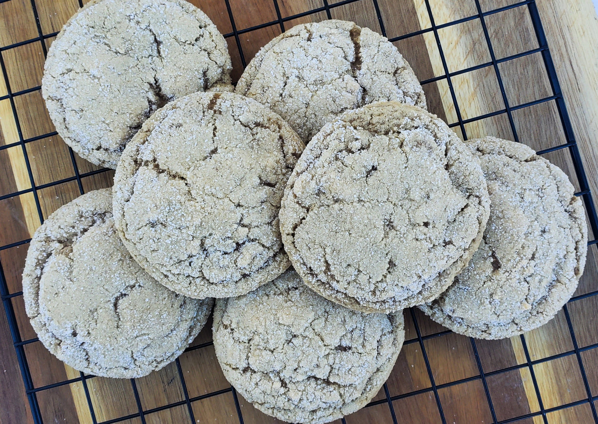 Maple brown sugar cookies from Let's Get Baked Artisan Desserts, showing a dozen freshly baked cookies on a plate.