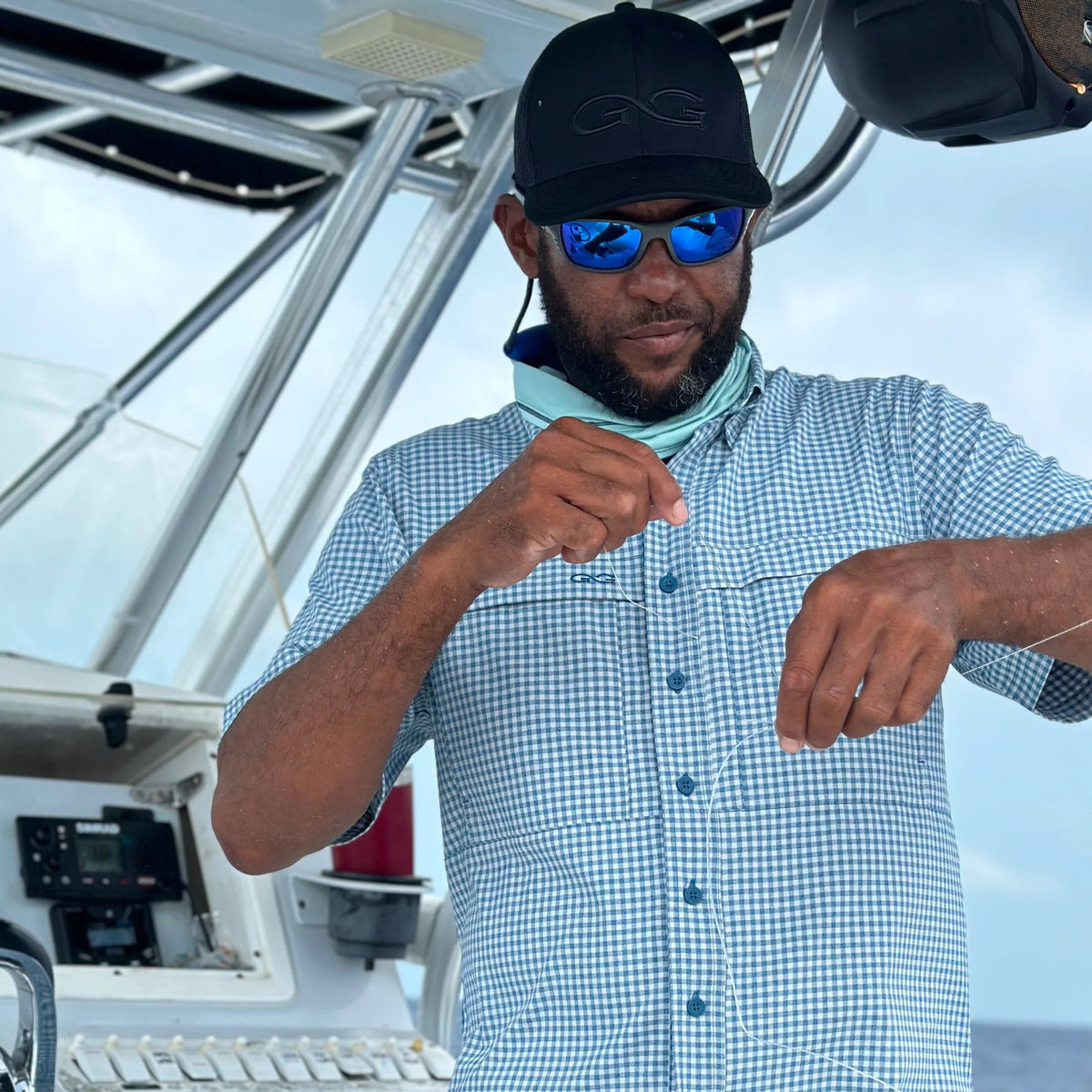 GameGuard Wahoo TekCheck Shirt featuring a checkered design, collar, and button-up front, ideal for casual or outdoor wear.