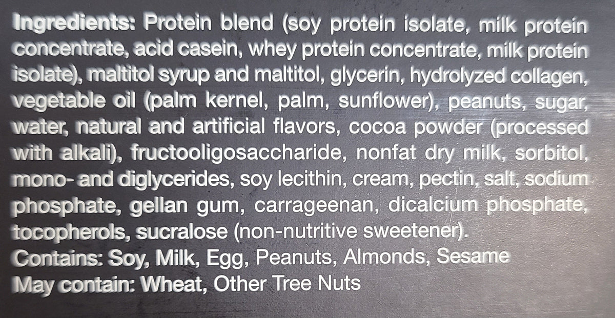 AmBari Nutrition Caramel Nut Protein Bar showing a close-up of the bar with caramel and nut pieces on the wrapper.