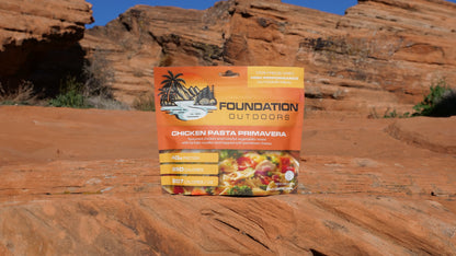Chicken Pasta Primavera meal from FOUNDATION Outdoors, featuring pasta with chicken, fresh vegetables, and vibrant spring flavors.
