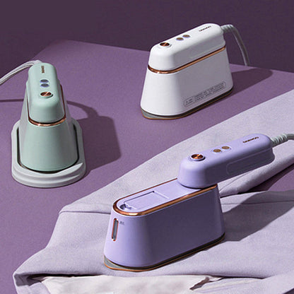 Small handheld steam iron by Sell My Stuff, ideal for ironing clothes at home or while traveling.