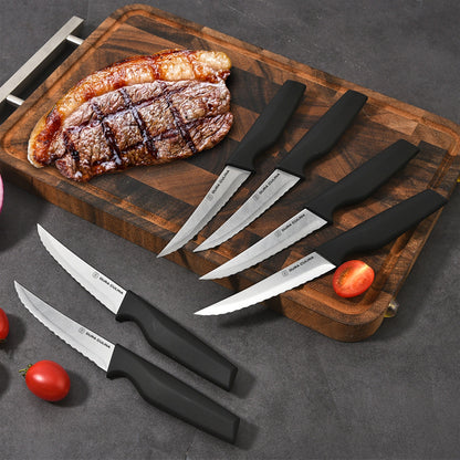 Dura Living 14-piece kitchen knife set with high carbon stainless steel blades, ergonomic handles, and a black wood storage block.