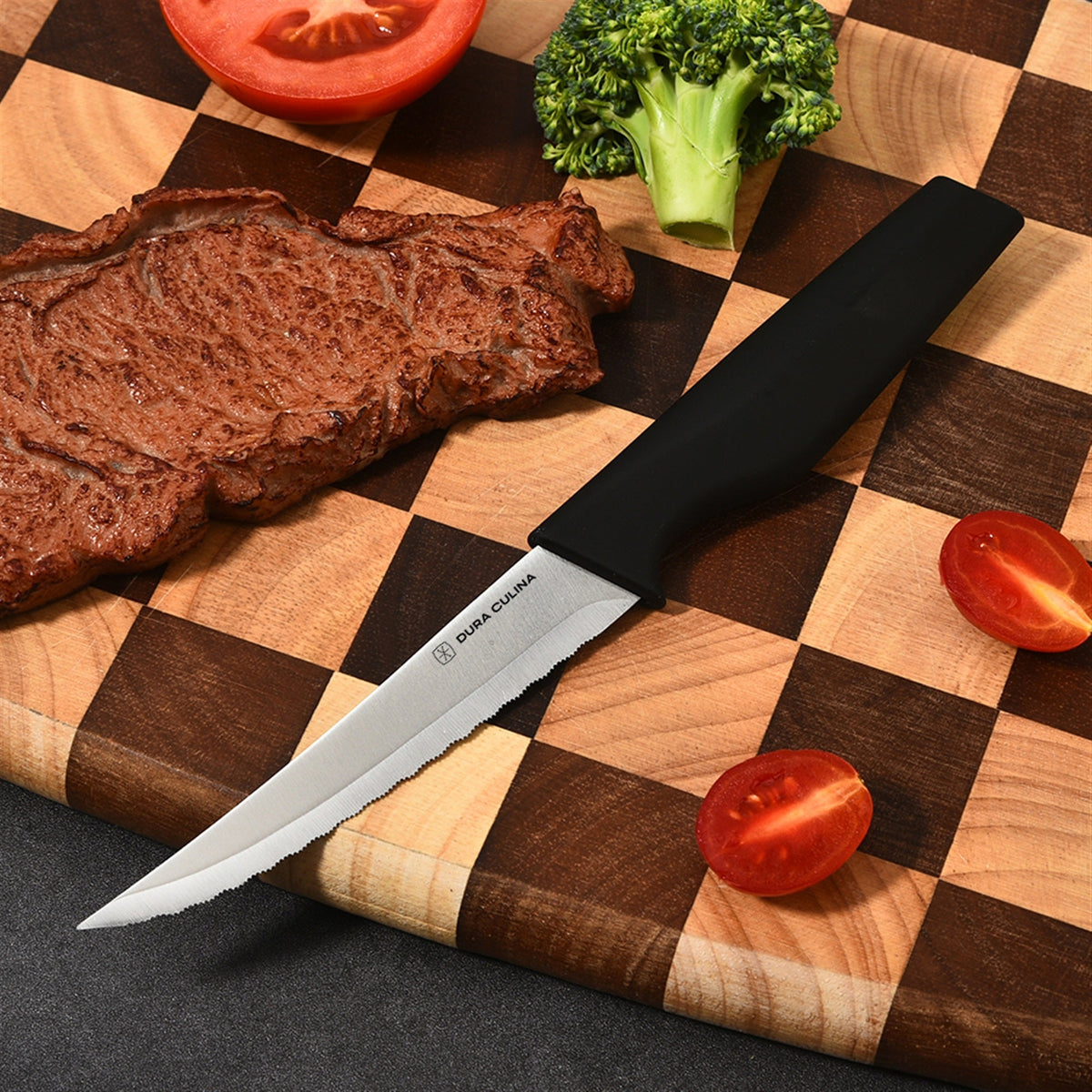 Dura Living 8-piece steak knife set with high carbon stainless steel serrated blades and ergonomic handles for dining.