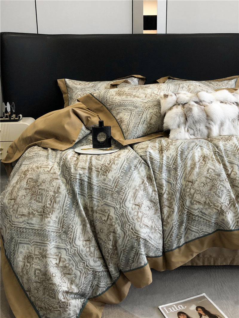 Long-staple cotton printed four-piece bedding set with soft patterned fabric and matching bed linens
