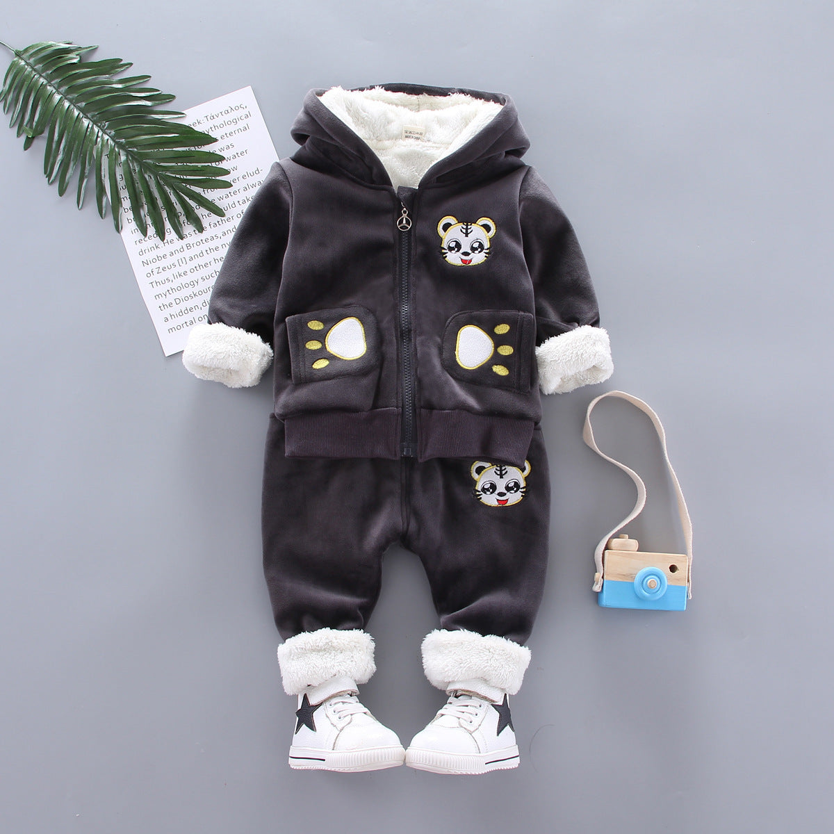 Golden mink plush winter clothing garment on display